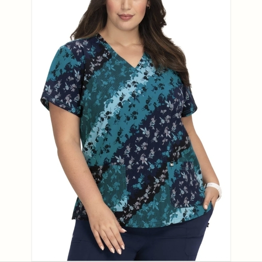 KOI Next Gen 1029PR Early Energy Top.  Bias Floral. Size Medium. New.With brea